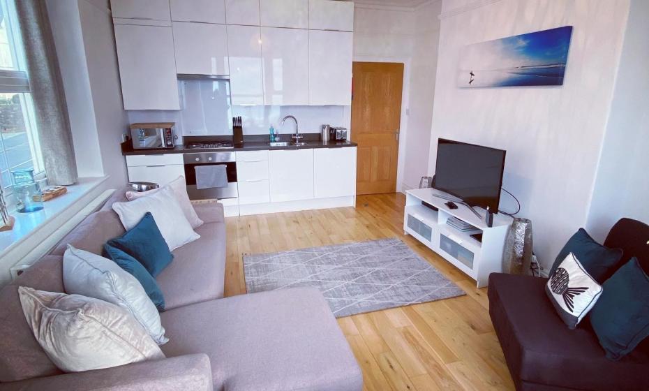 Spacious open plan living and kitchen area in Seablue View Apartment Woolacombe