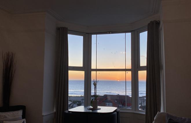 Stunning sunset beach views from one of Seablue View's windows... sit and relax watching the sun go down!