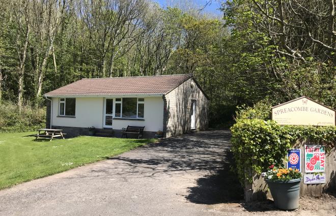 Azalea Cottage, backed by woodland