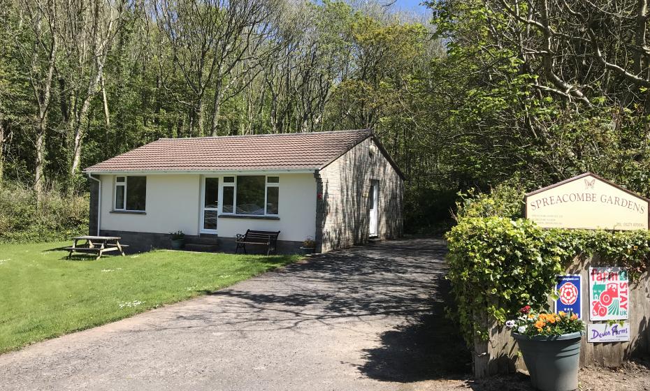 Azalea Cottage, backed by woodland