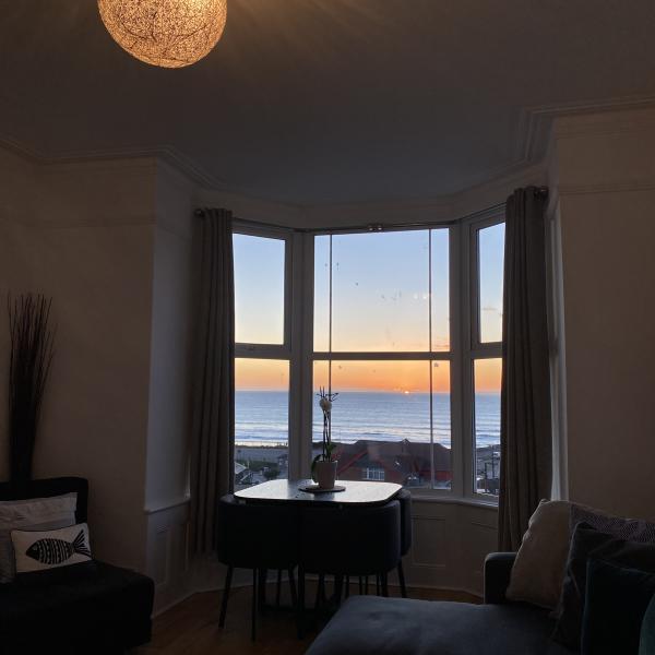 Stunning sunset beach views from one of Seablue View's windows... sit and relax watching the sun go down!